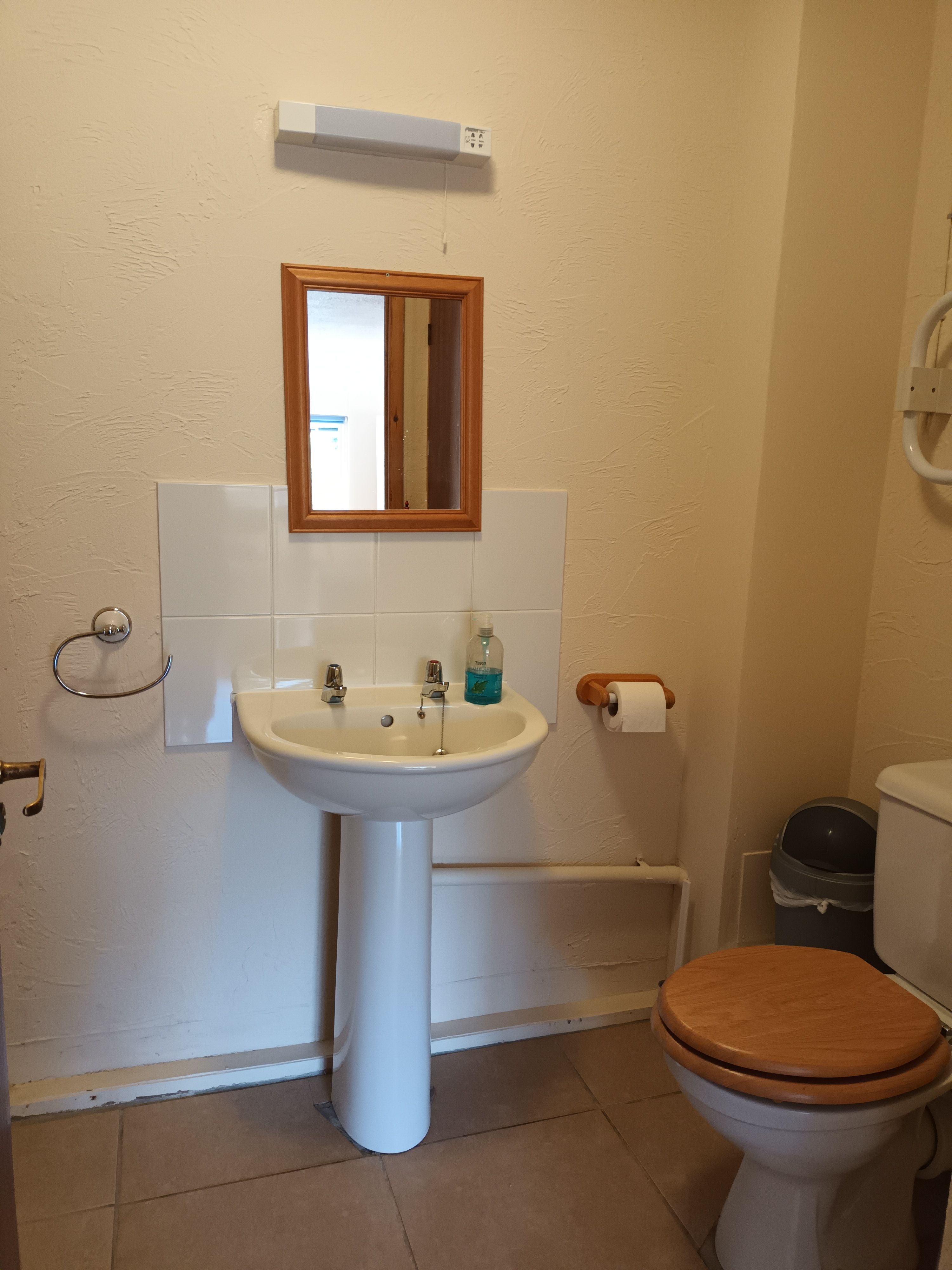 Separate ground floor toilet and sink is useful for larger groups