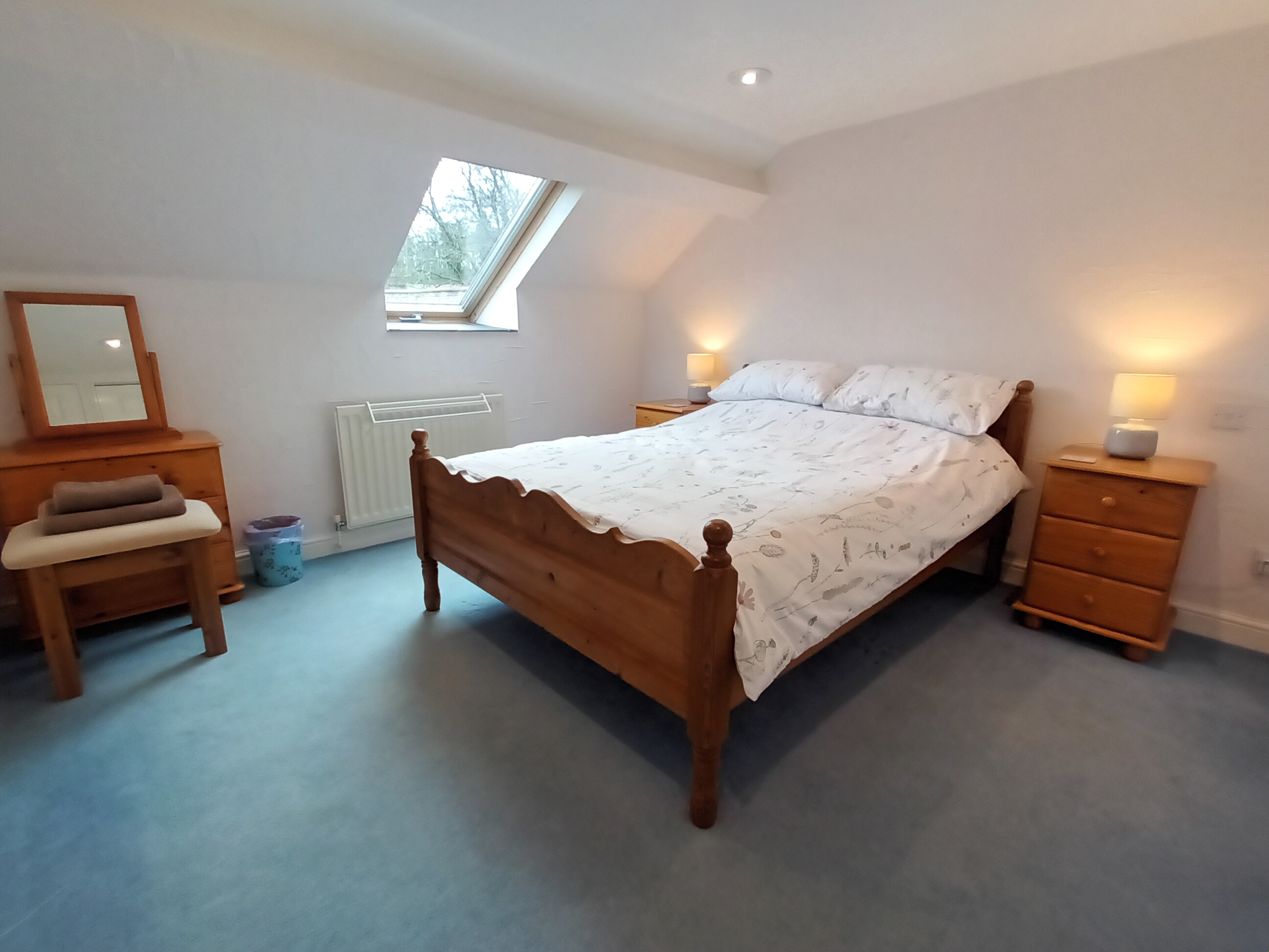 This first floor bedroom has a double bed, plenty of storage and good natural light