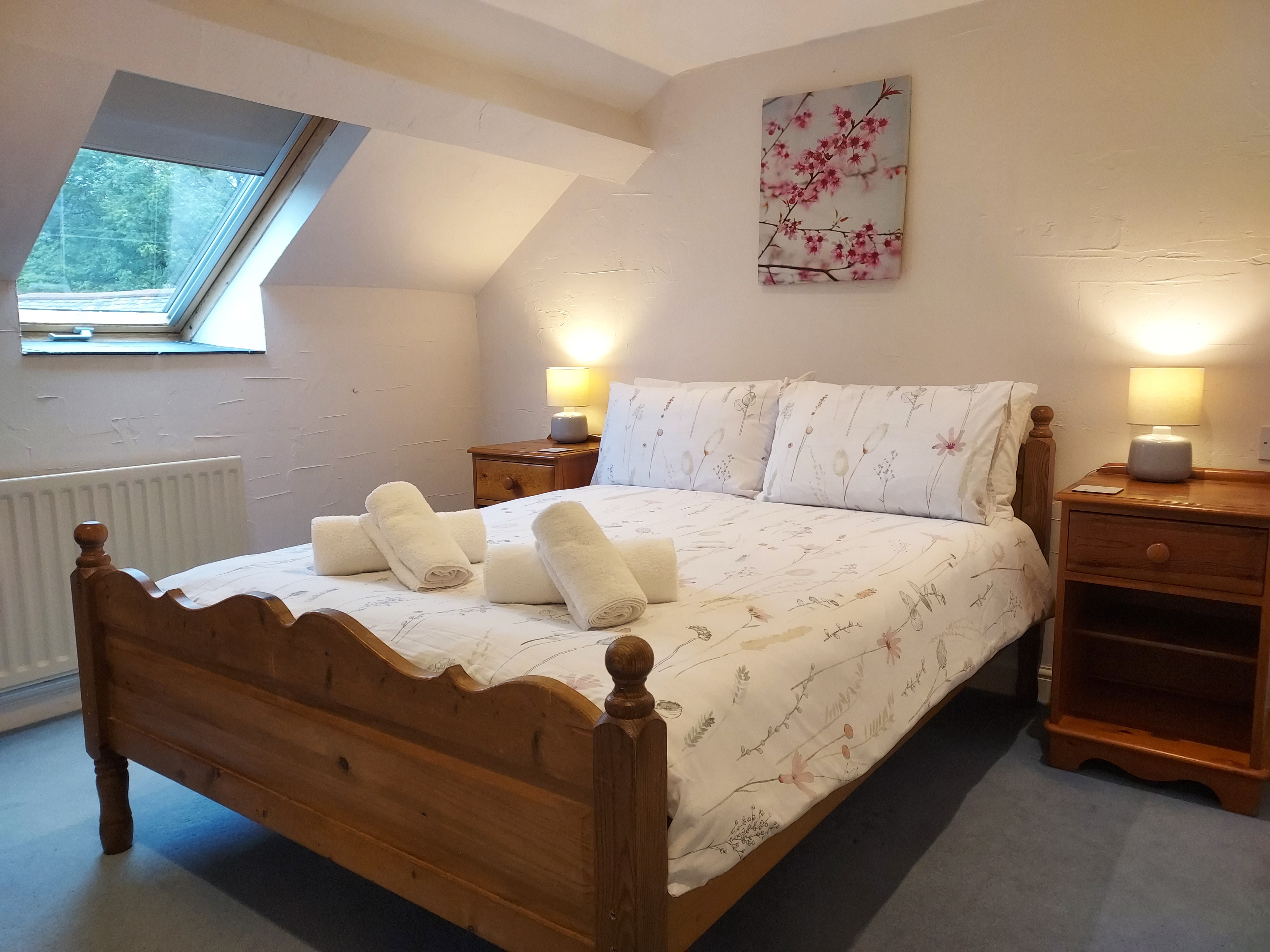 This first floor bedroom has a double bed, plenty of storage and good natural light