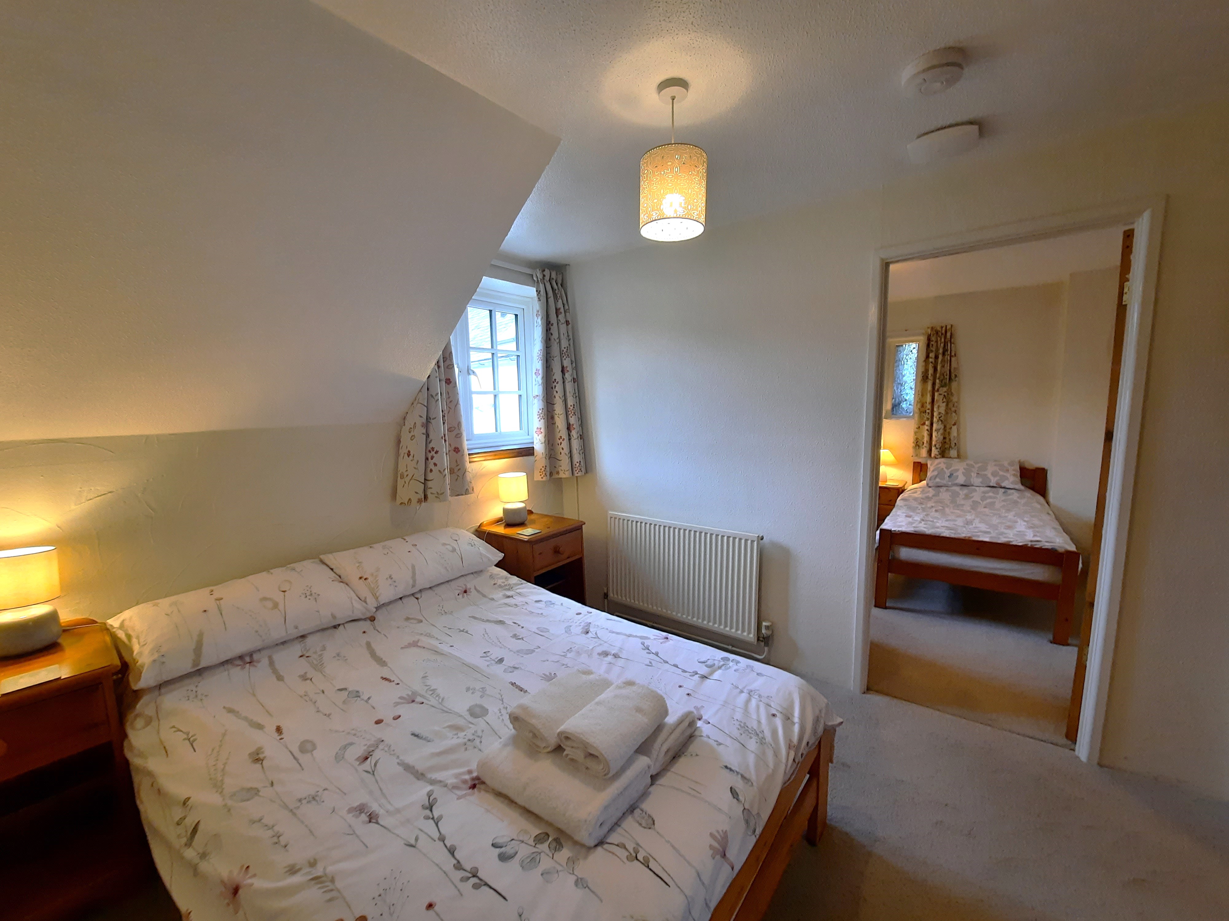 Twin room is accessed directly from the double bedroom