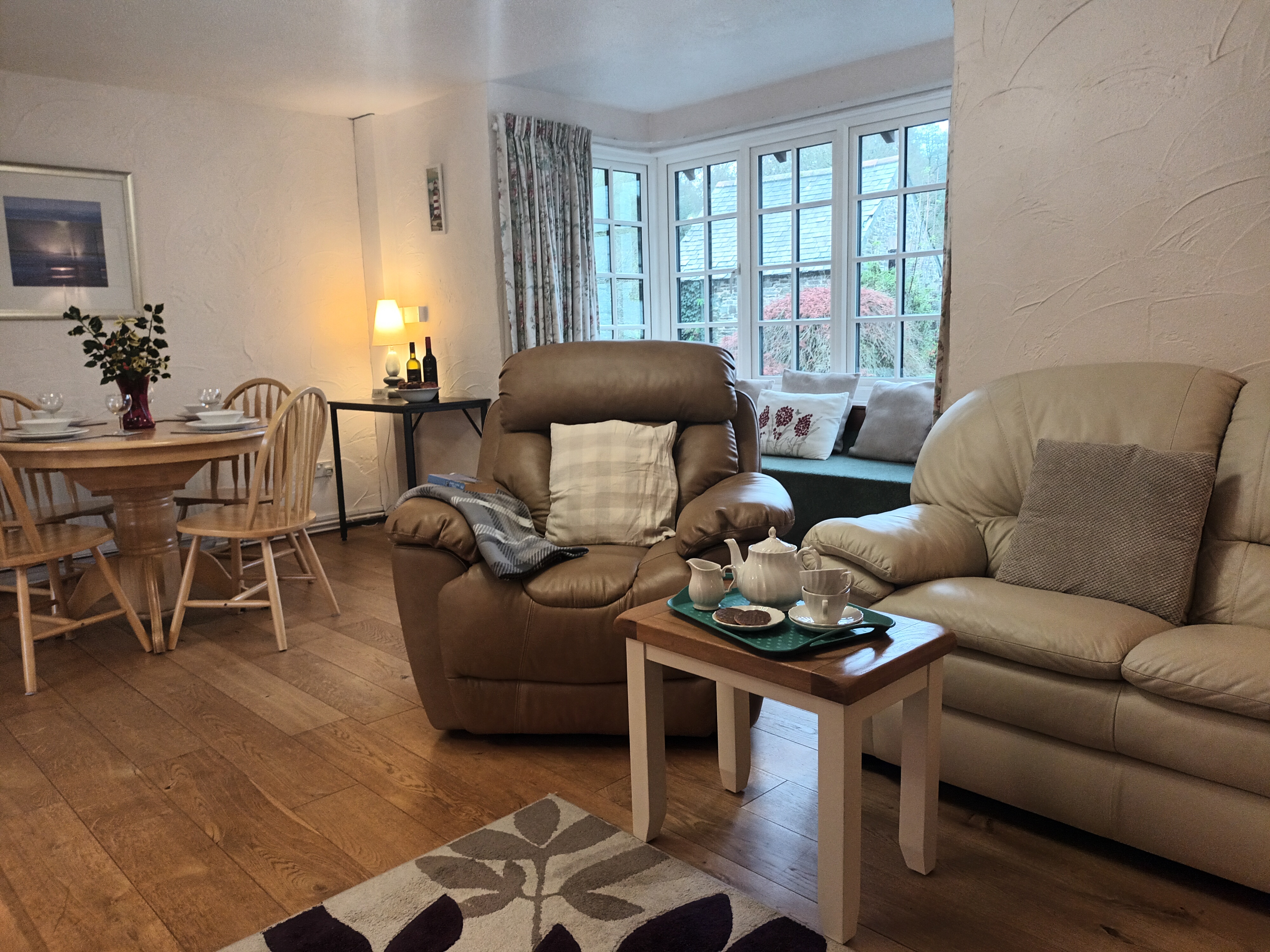 Comfortable seating area with electric log-effect fire and 42" smart TV