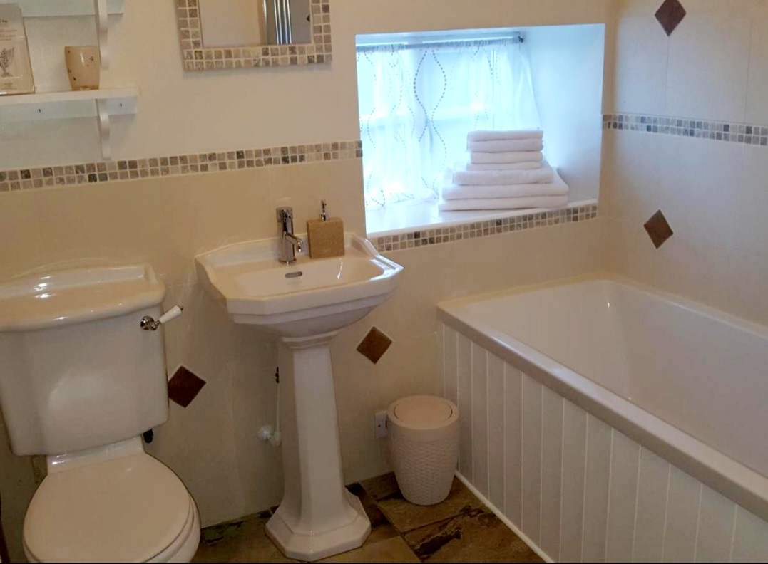 Holiday Cottage - Bathroom with Bath and Over Bath Shower