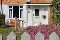 Front garden with outside bench seating