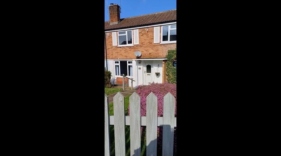 Front garden with outside bench seating