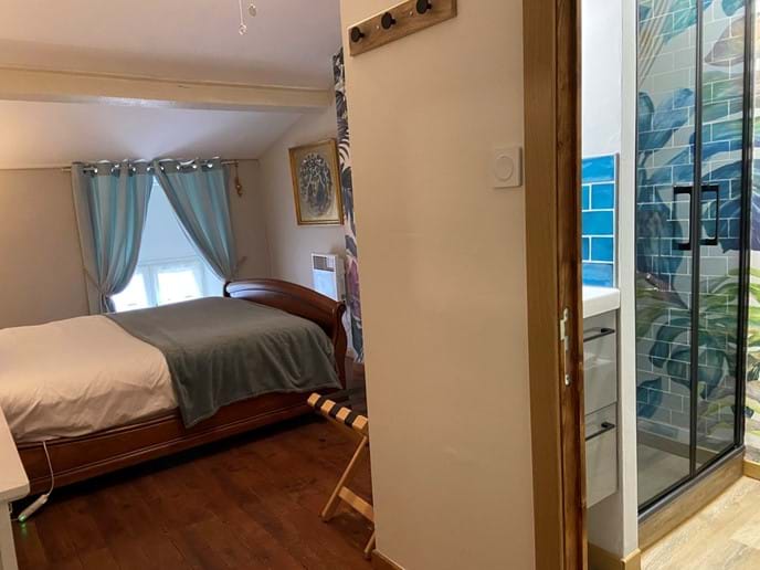 Upstairs bedroom in smaller cottage with ensuite shower room