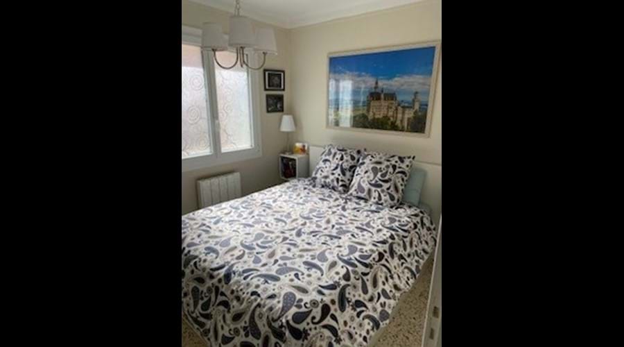Second bedroom overlooking the courtyard