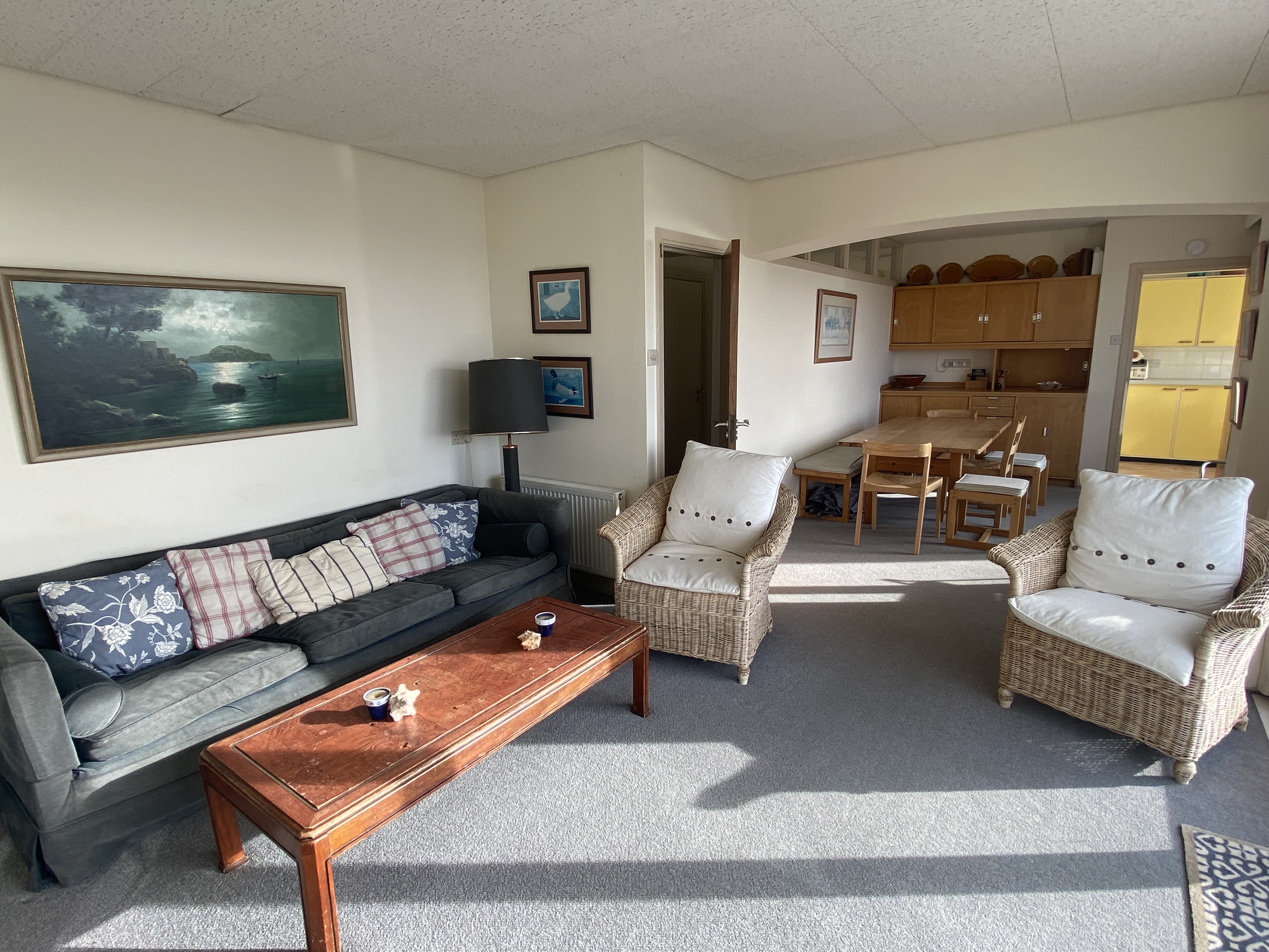 Sitting room and dining area leading to kitchen