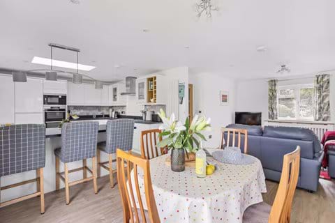 Spacious, bright, and beautifully connected – cook, dine, and unwind together in this welcoming heart of the home.