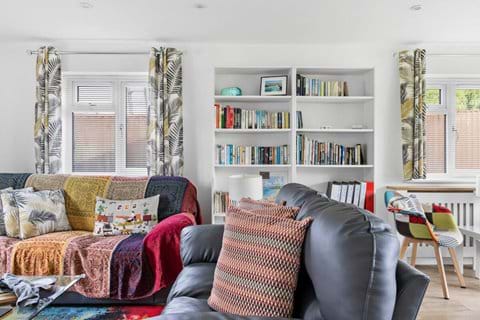 The bright living room, perfect for slow mornings and cosy nights.