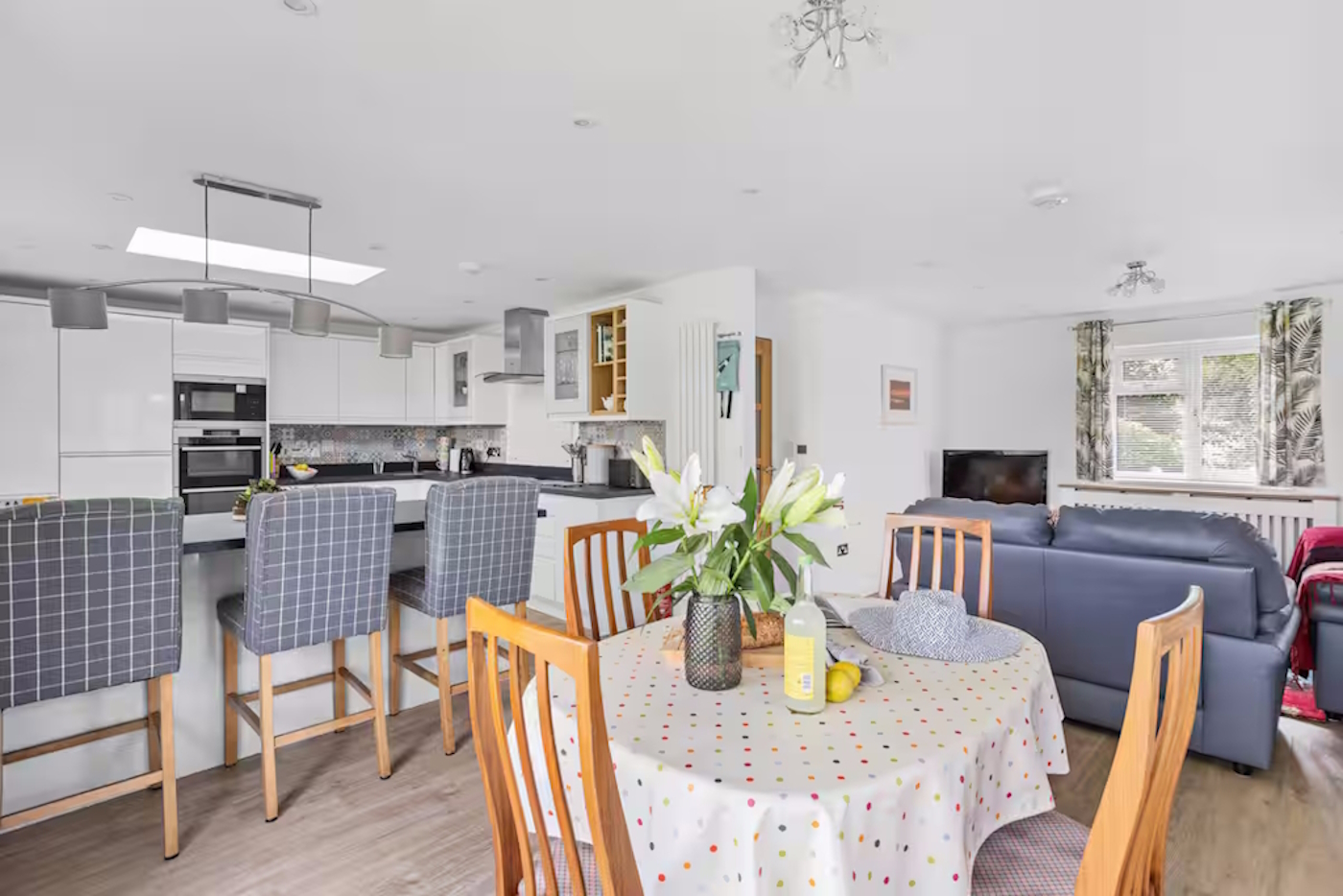 Spacious, bright, and beautifully connected – cook, dine, and unwind together in this welcoming heart of the home.