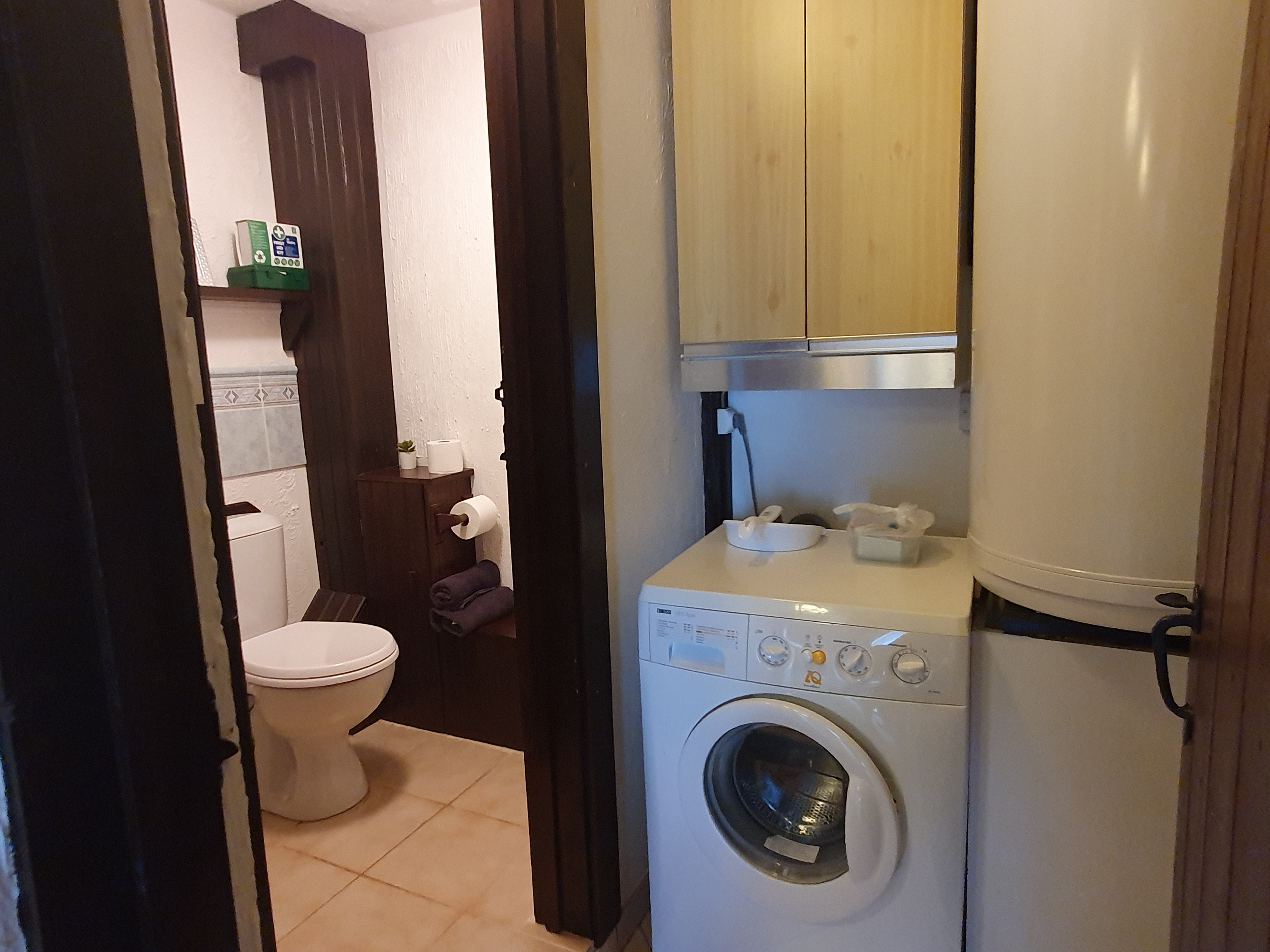 Utility room and downstairs cloakroom