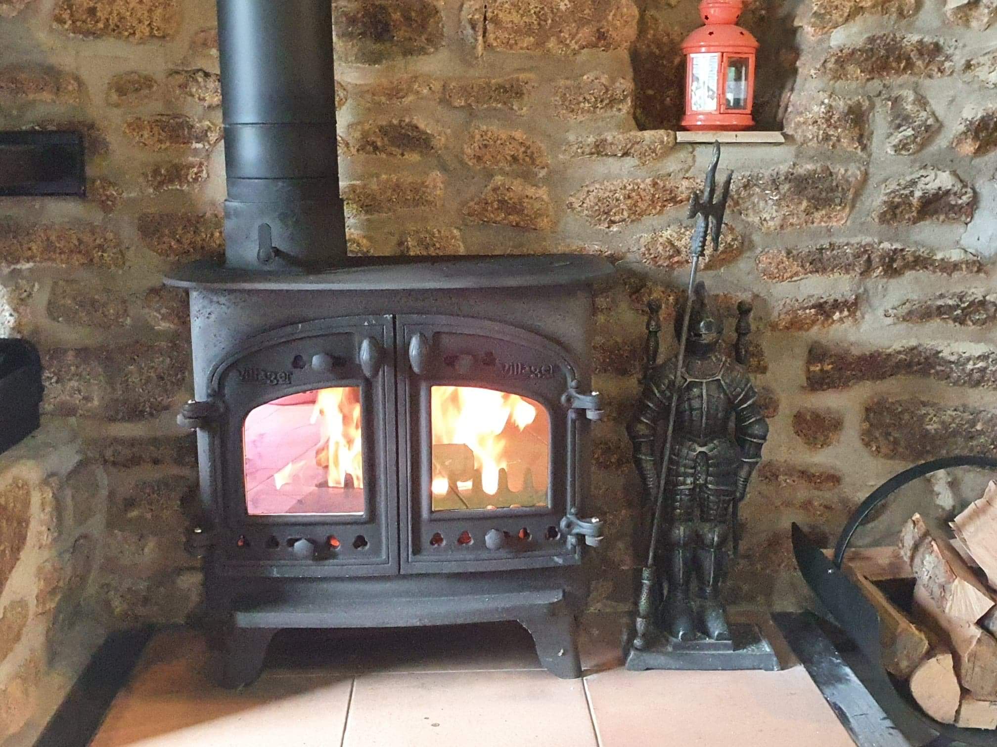 Log Burner in open plan lounge/kitchen/diner