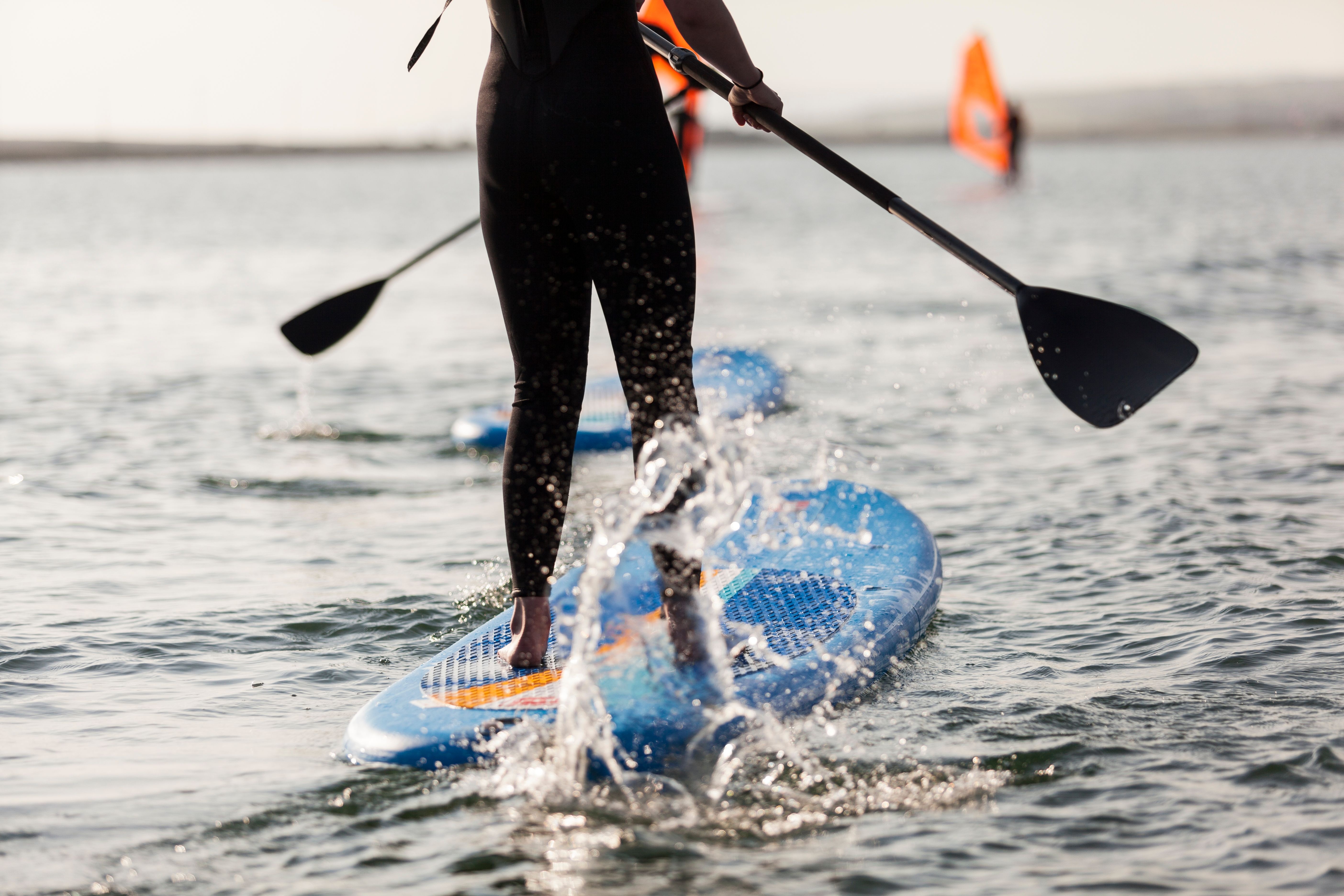 Enjoy the thrill of paddleboarding on Portland Harbour, with calm waters and stunning coastal views—a perfect adventure for water sports enthusiasts