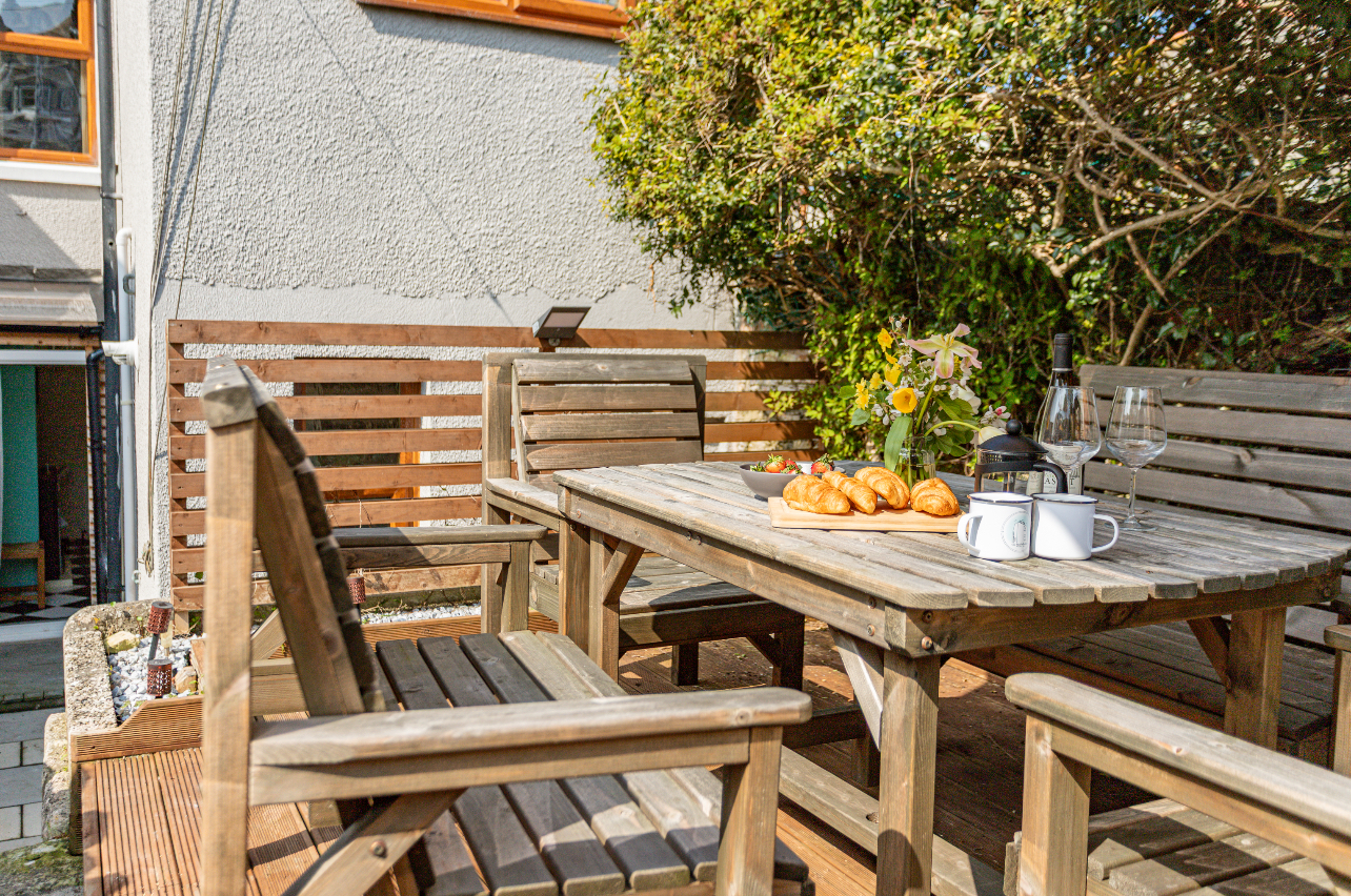 Cottage garden seating area for morning coffee or evening drinks in Portland