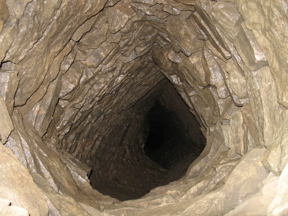 If you peer through a gap in the sleepers that sit atop the many mounds in the fields around Brassington, you may see something like this...