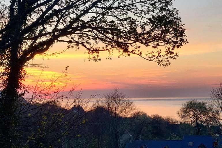 Sunset over Cardigan Bay from Ty Nant Tresaith 