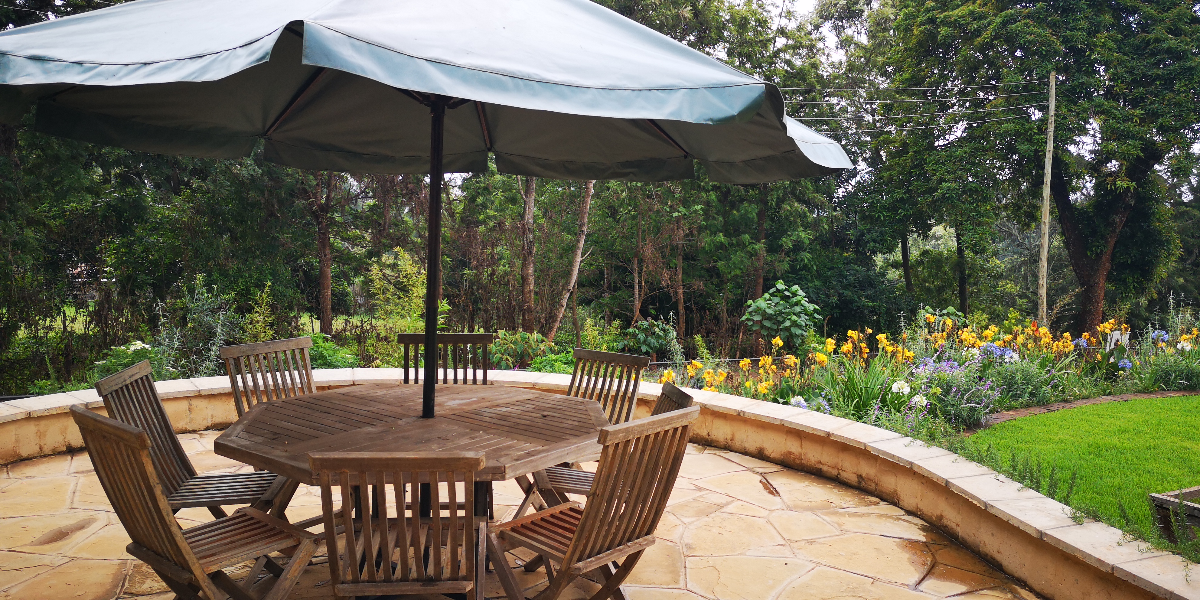 Garden dining table for eight at Pond Cottage Tigoni