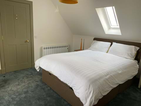 Bedroom three has a king-size bed and ensuite shower room.