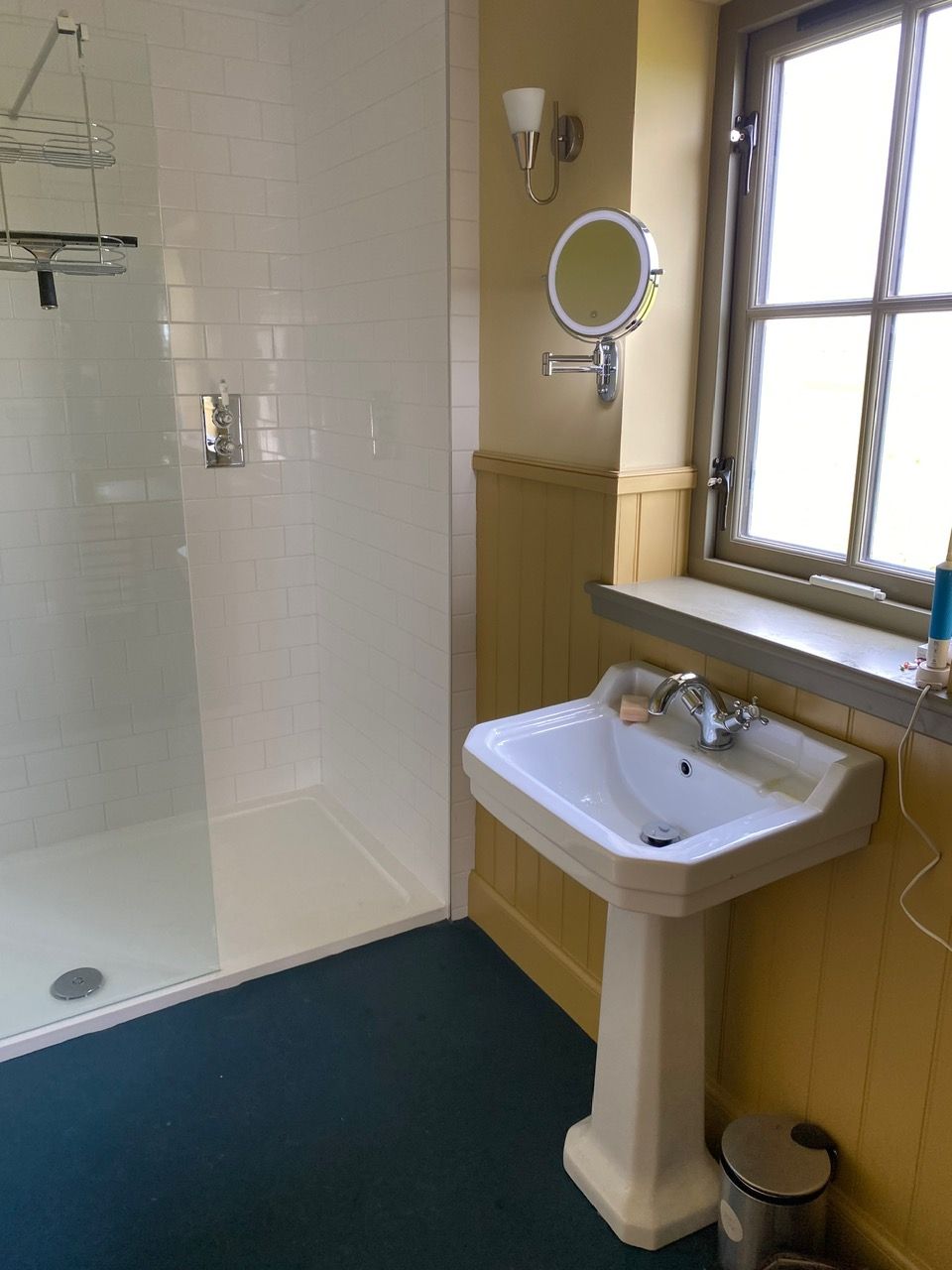 The downstairs shower room with 'Jand and Jill' doirrs to the bedroom and boot room