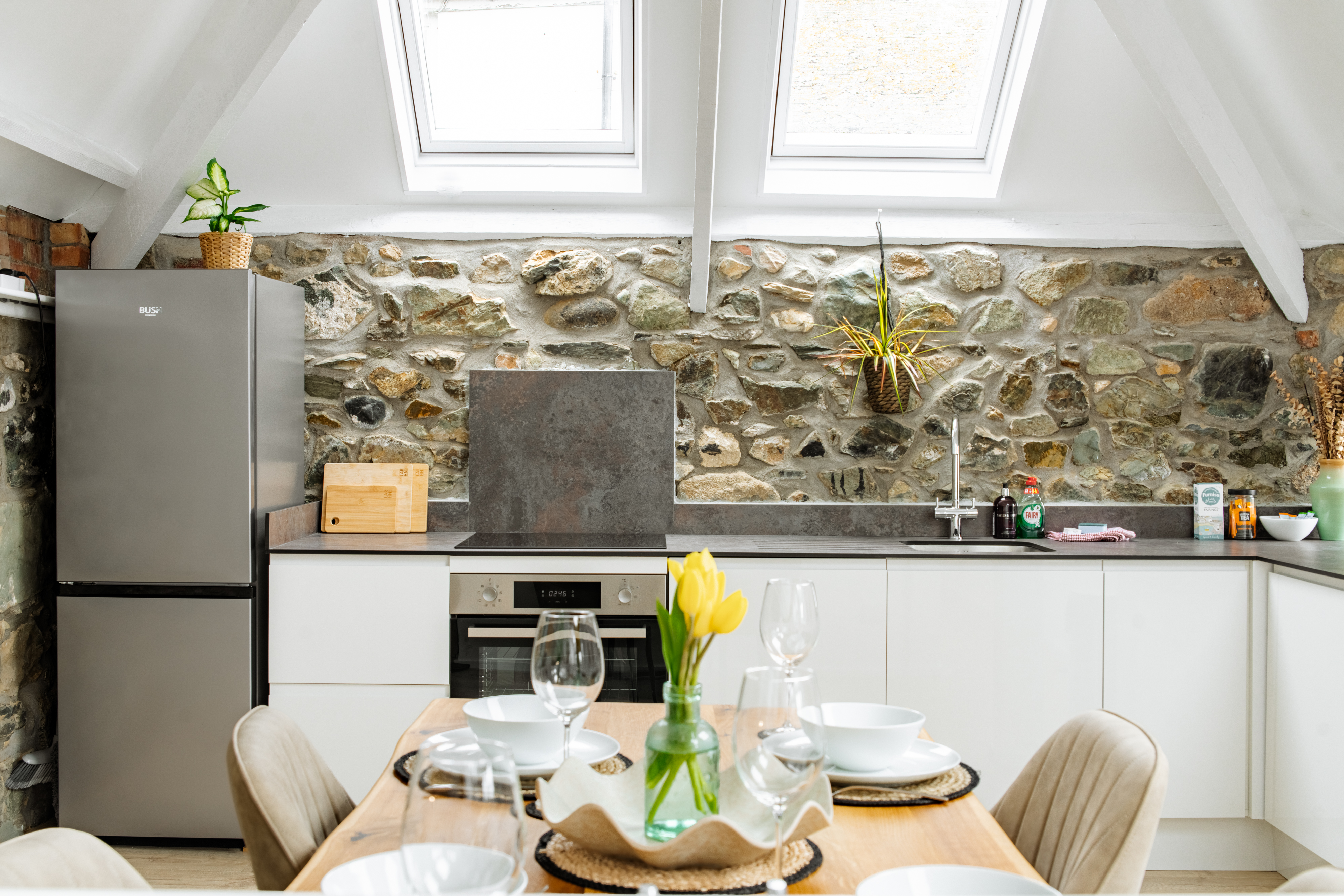 Spacious open plan living and dining area with views over the lighthouse
