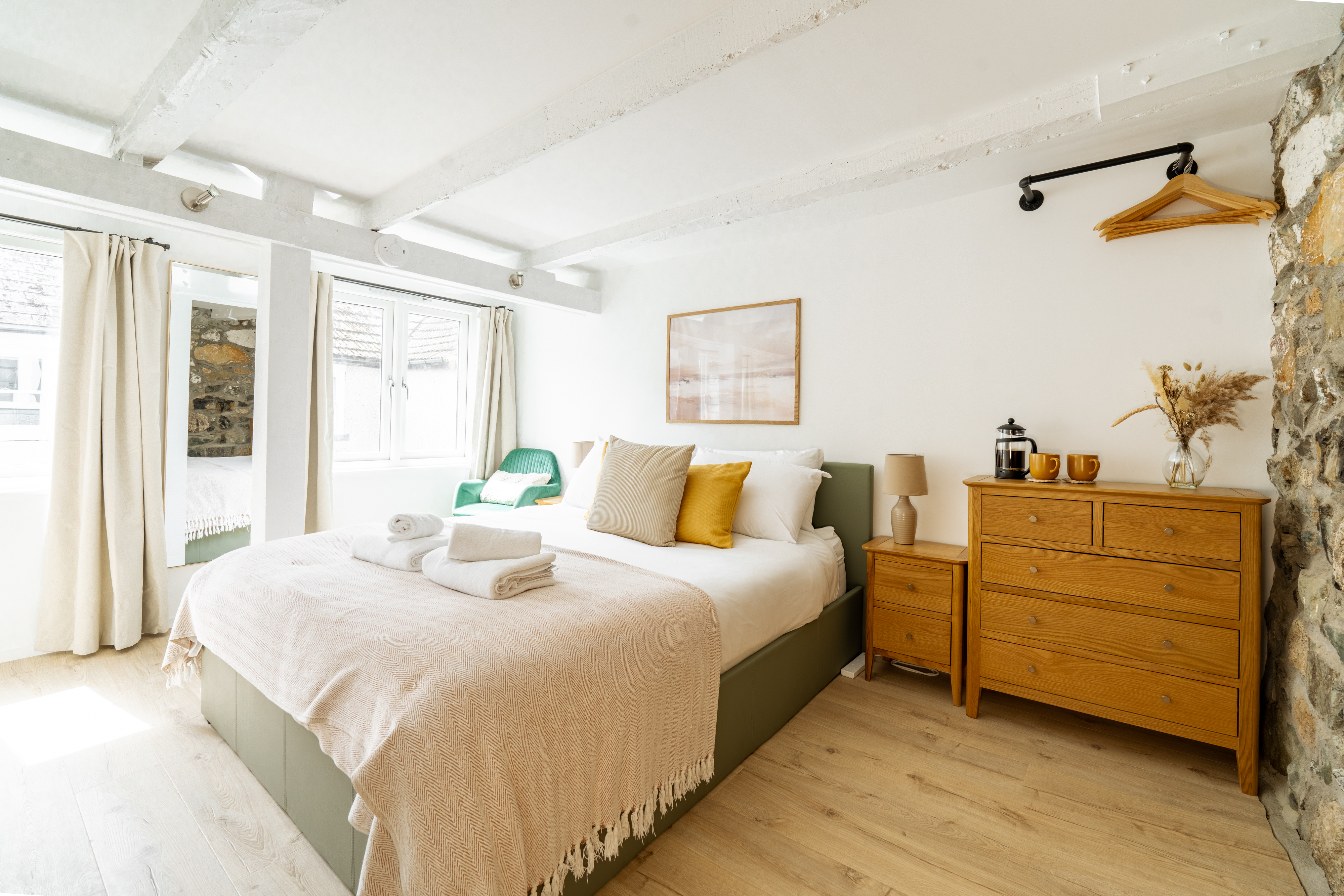 The spacious and light king size bedroom.