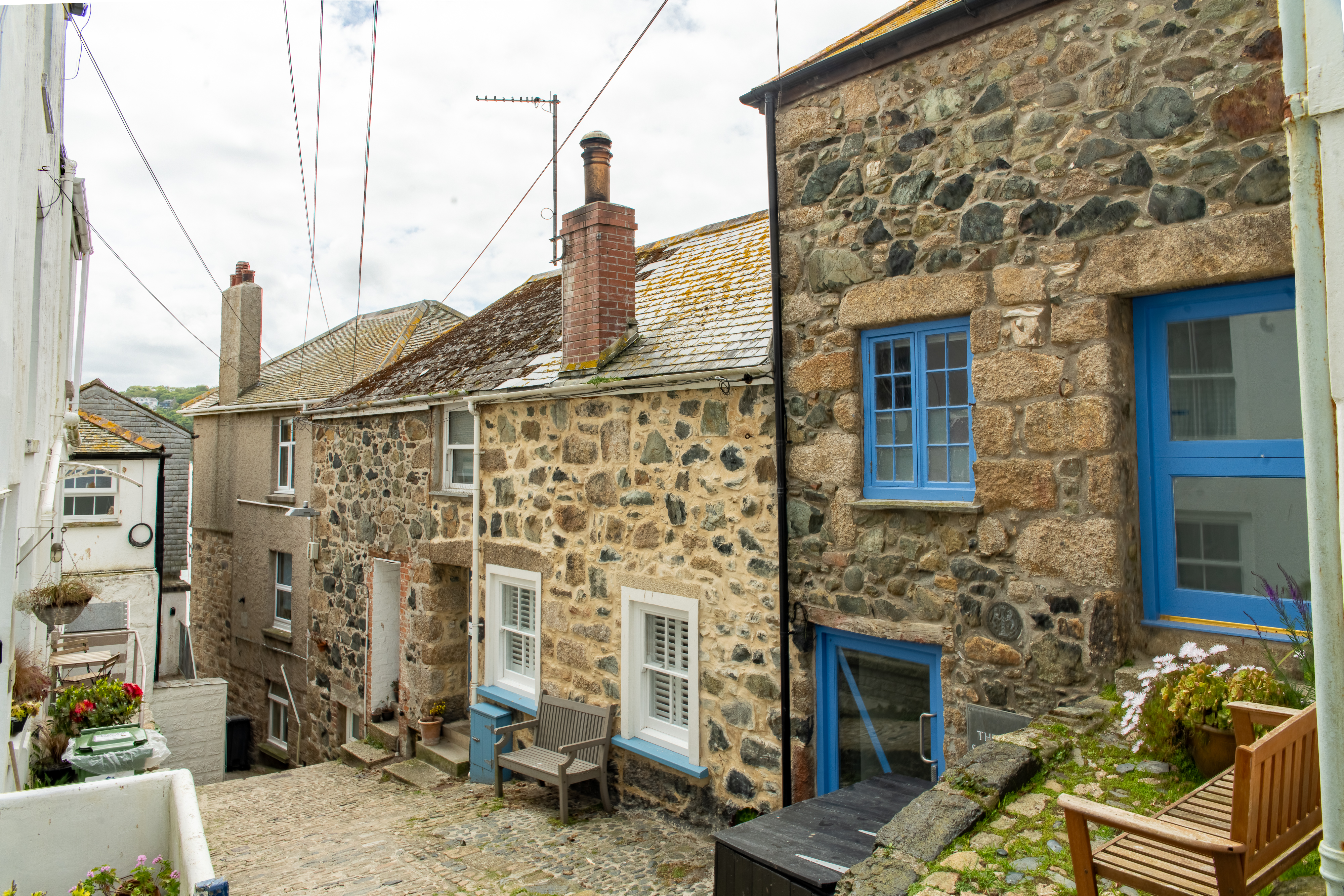 The exterior of the beautiful old building -  the building with blue windows.