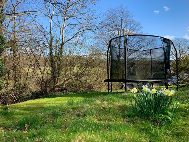 Enclosed trampoline
