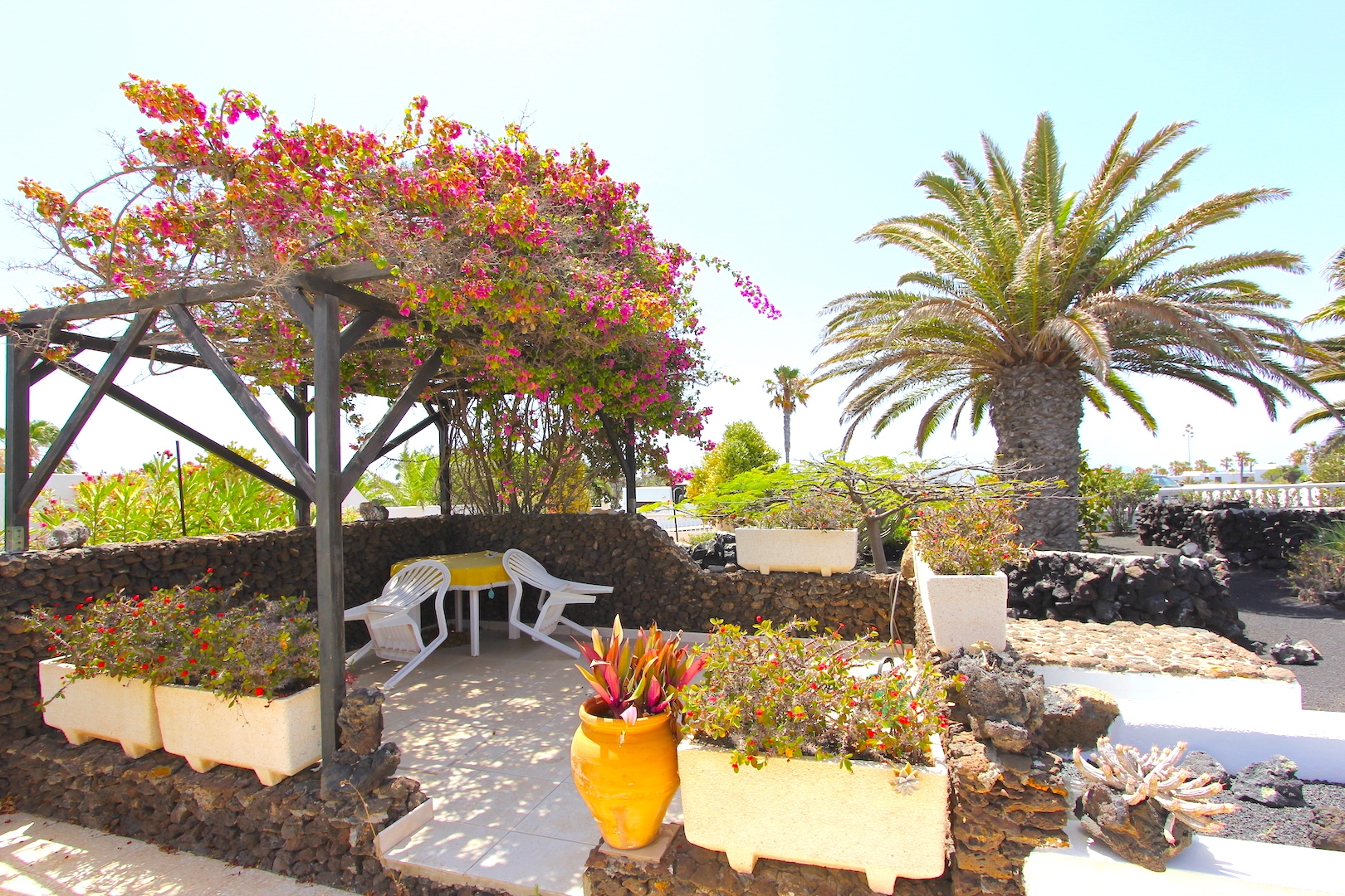 Raised pergola patio