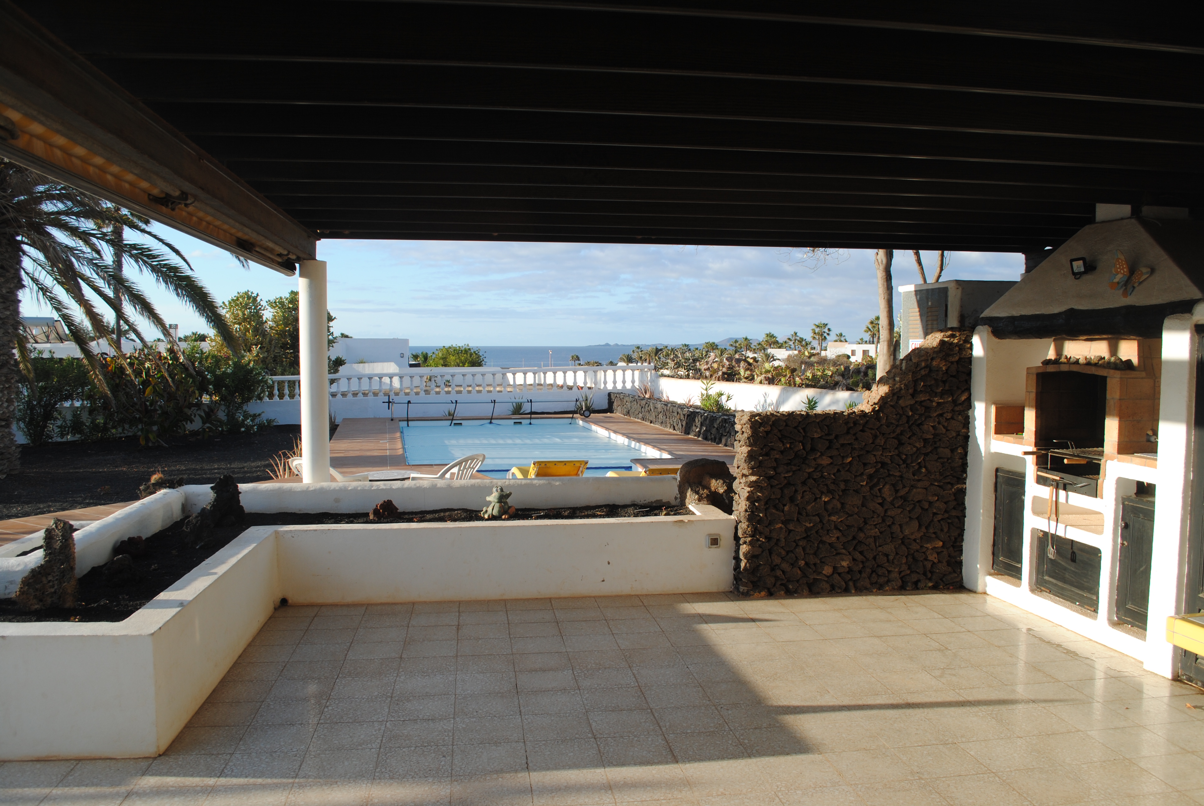 View across sea to Fuerteventura from shaded patio