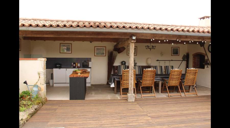 Outdoor Kitchen and Dining Area