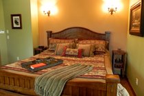King bed in "Moose Roost" master suite