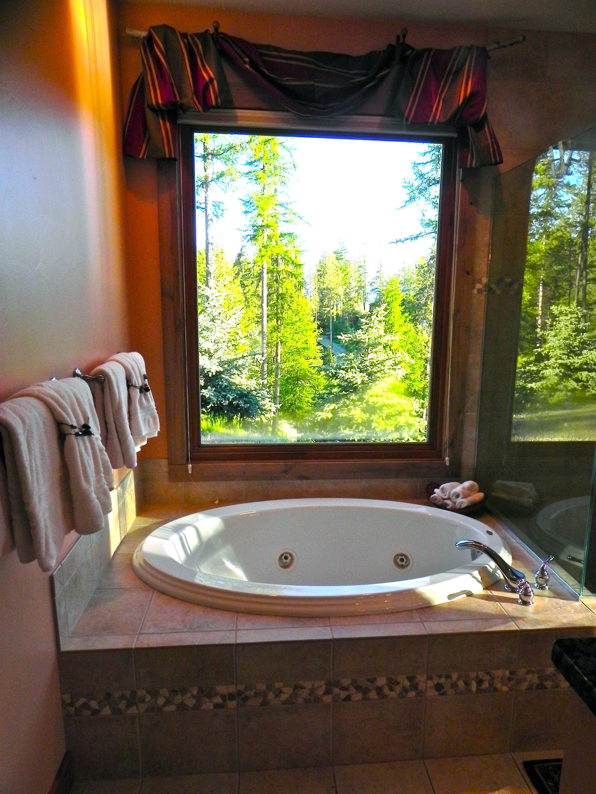 Spa tub in master bath with stunning views