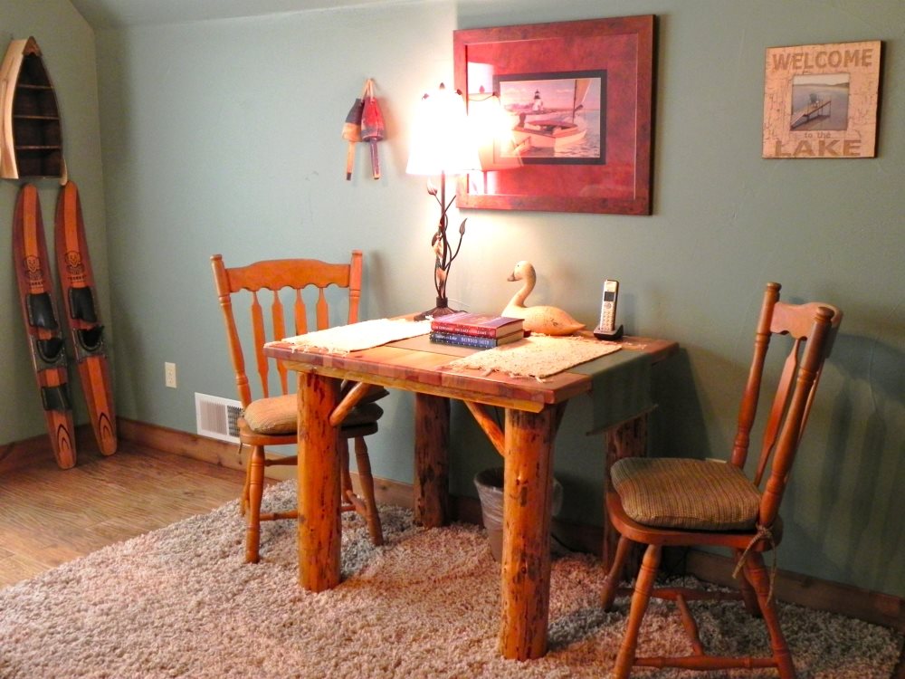 Sitting area, with table for laptop computer, games or puzzles 