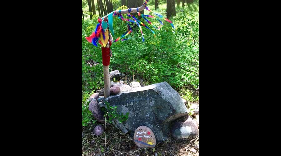 Guests contribute to the alters at the hill top circle