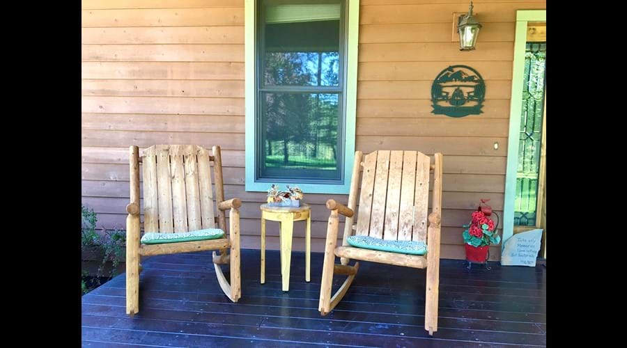 Enjoy a cup of coffee on the from porch