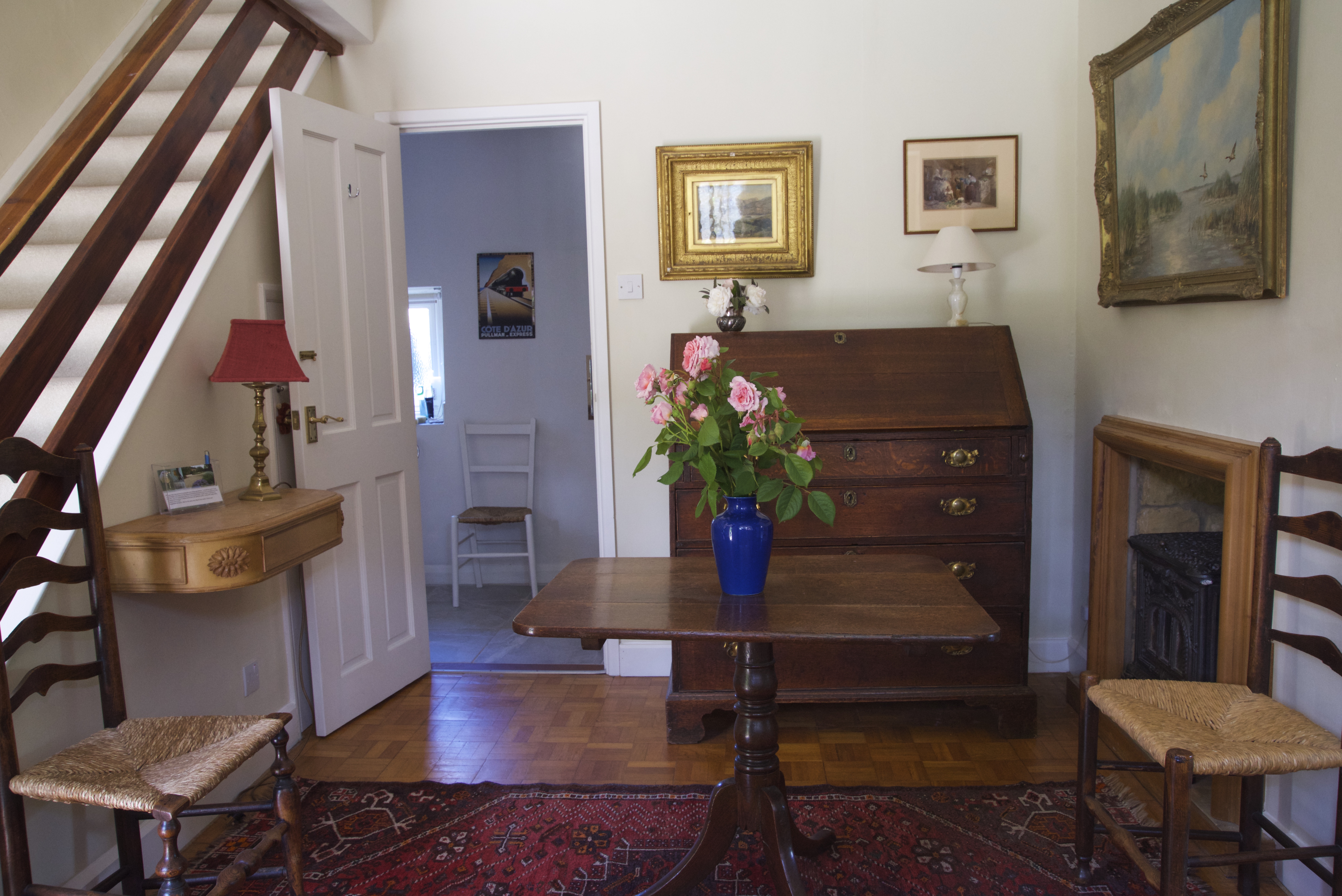 Downstairs cloakroom with shower is off the hall
