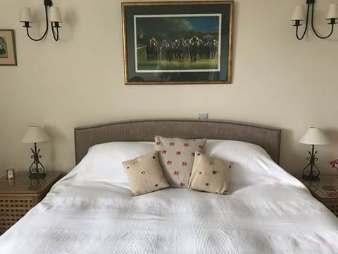 American King bed with 2 mattresses, two duvets