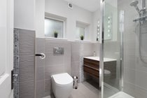 Shower Room immediately across hallway from groundfloor double with electric shower, wc, washbasin, shaver point and demister mirror