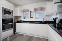 Kitchen features Double Oven, built in microwave, dishwasher, gas hob, fridge, toaster, kettle