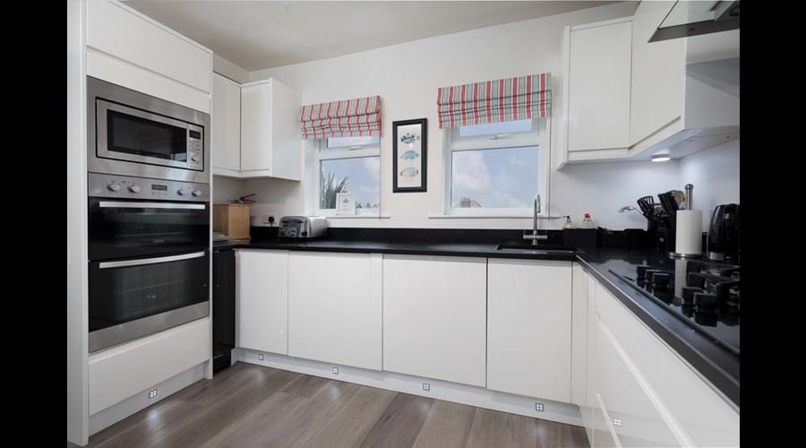 Kitchen features Double Oven, built in microwave, dishwasher, gas hob, fridge, toaster, kettle