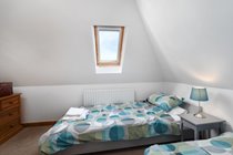 Twin Room with ensuite shower room NB Beds are suitable for adults but are at a low height from floor so not suitable for elderly or guests with less mobility