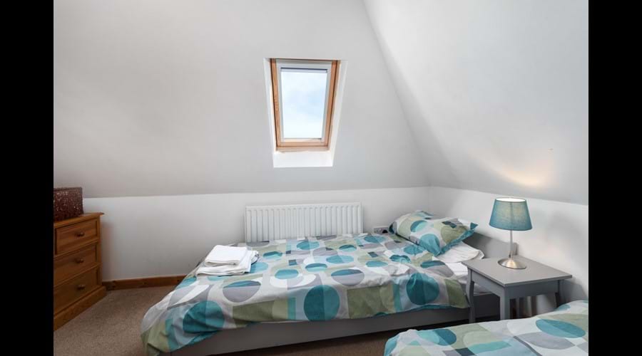 Twin Room with ensuite shower room NB Beds are suitable for adults but are at a low height from floor so not suitable for elderly or guests with less mobility
