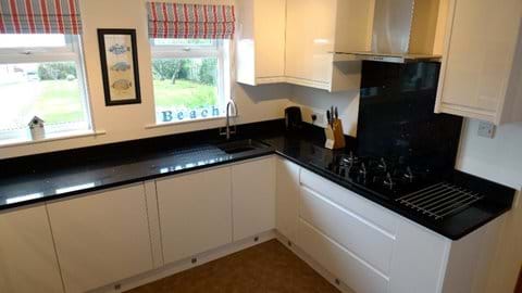 Newly fitted white gloss kitchen